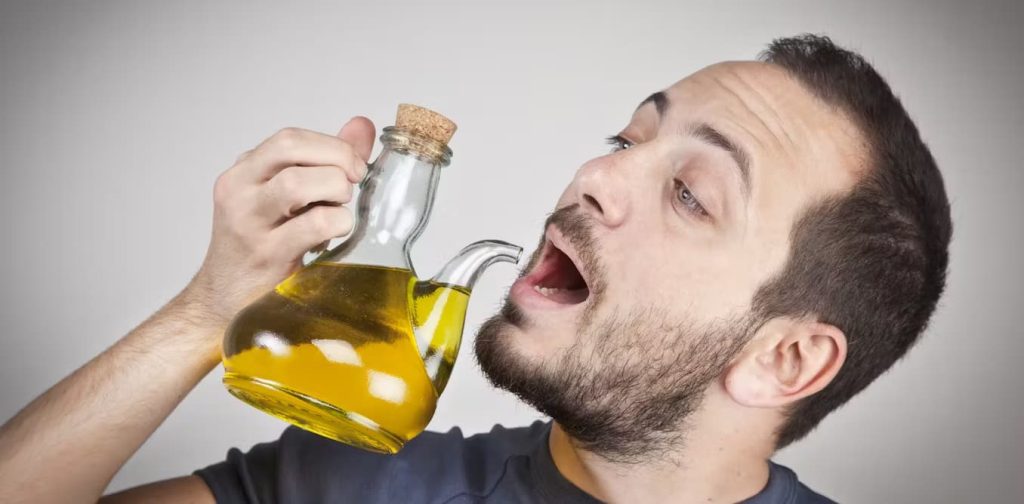 Discover how much olive oil per day is healthy. Learn about the right dosage, expert insights, and how to use it properly.